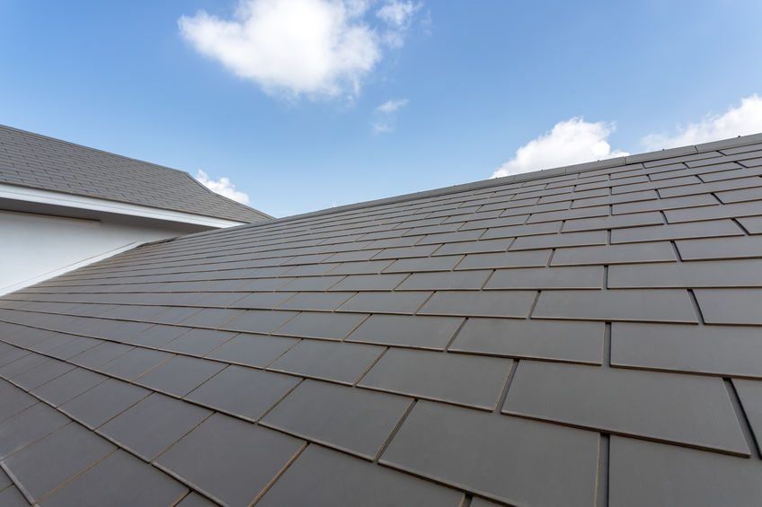 Slate roof against blue sky